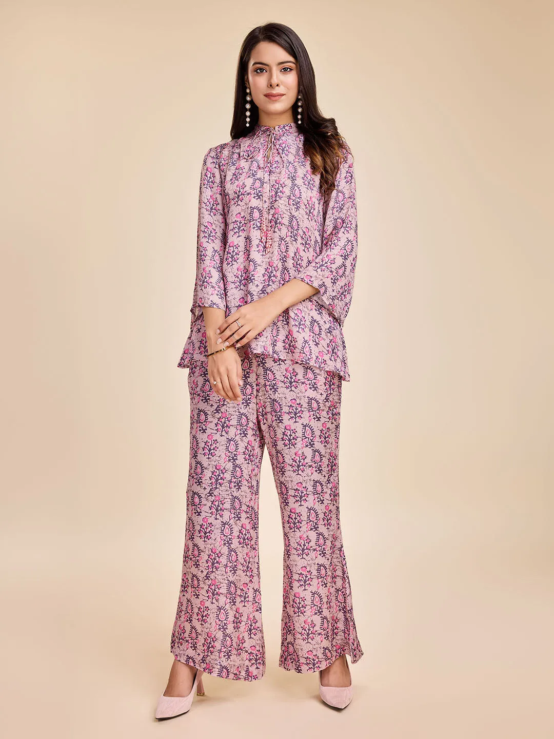 stylish floral printed shirt with long cuff sleeves and round tie-up embellished neck & a mid-rise flared pants coord set in Modal Satin - Pink