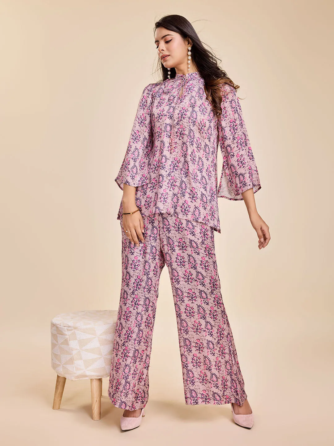 stylish floral printed shirt with long cuff sleeves and round tie-up embellished neck & a mid-rise flared pants coord set in Modal Satin - Pink